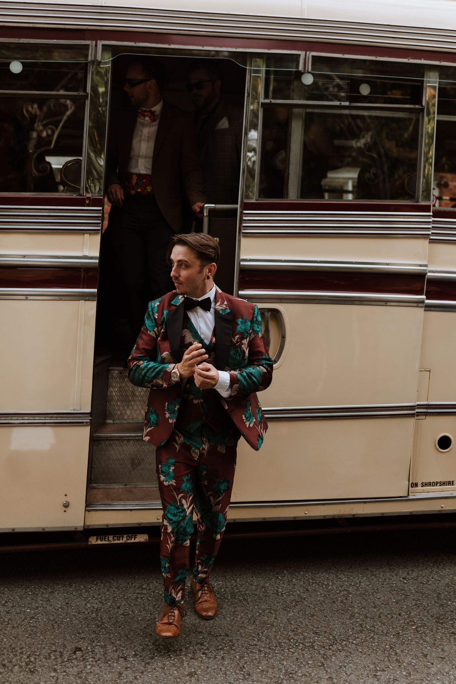 Guests arriving on vintage 60s bus to montgomery church