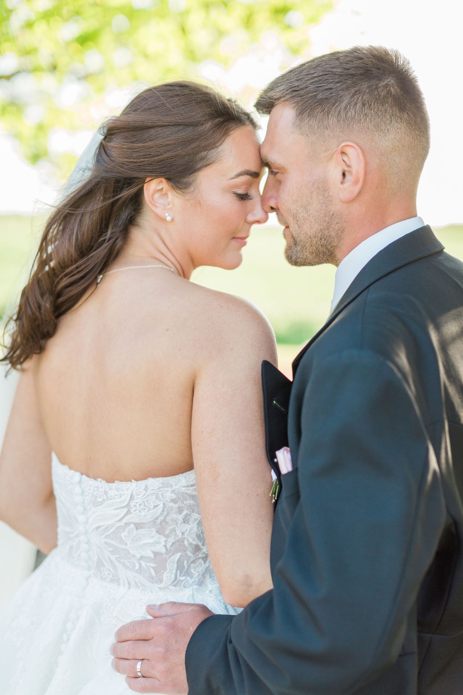 Hayley Elizabeth Photography Cotswolds wedding photographer lapstone barn couple facing towards one another