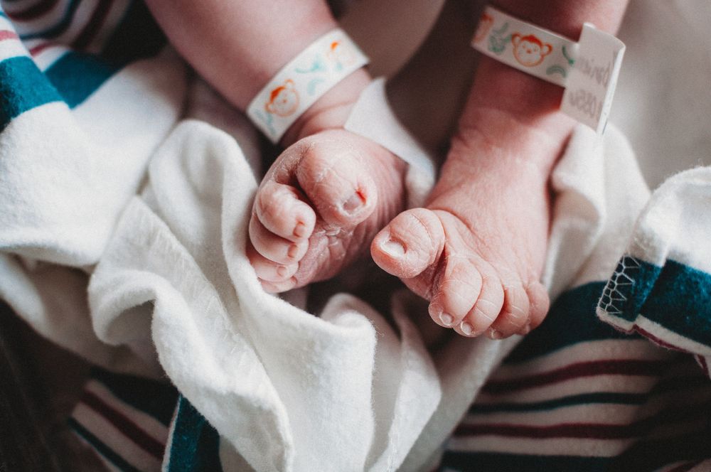 Tiny newborn toes captured during fresh 48 session at CHI St. Alexius in Dickinson, ND