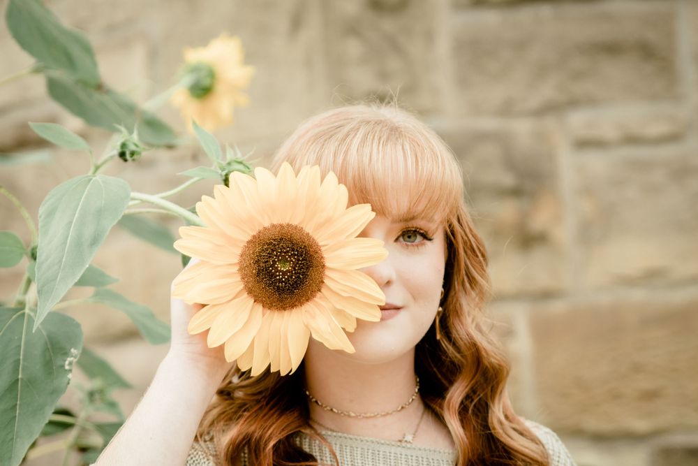 Senior Girl Sunflower Field Peeking