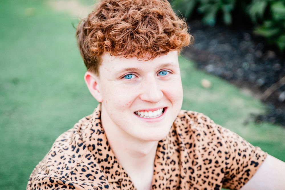 Senior Boy Animal Print Red Hair Blue Eyes