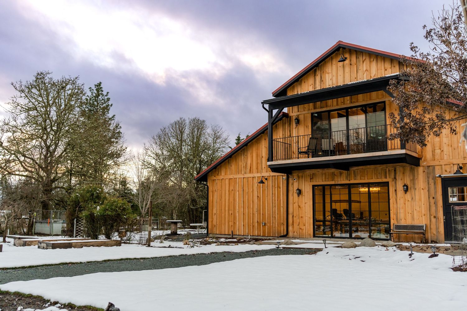 Sungate Wedding barn with snow on the ground