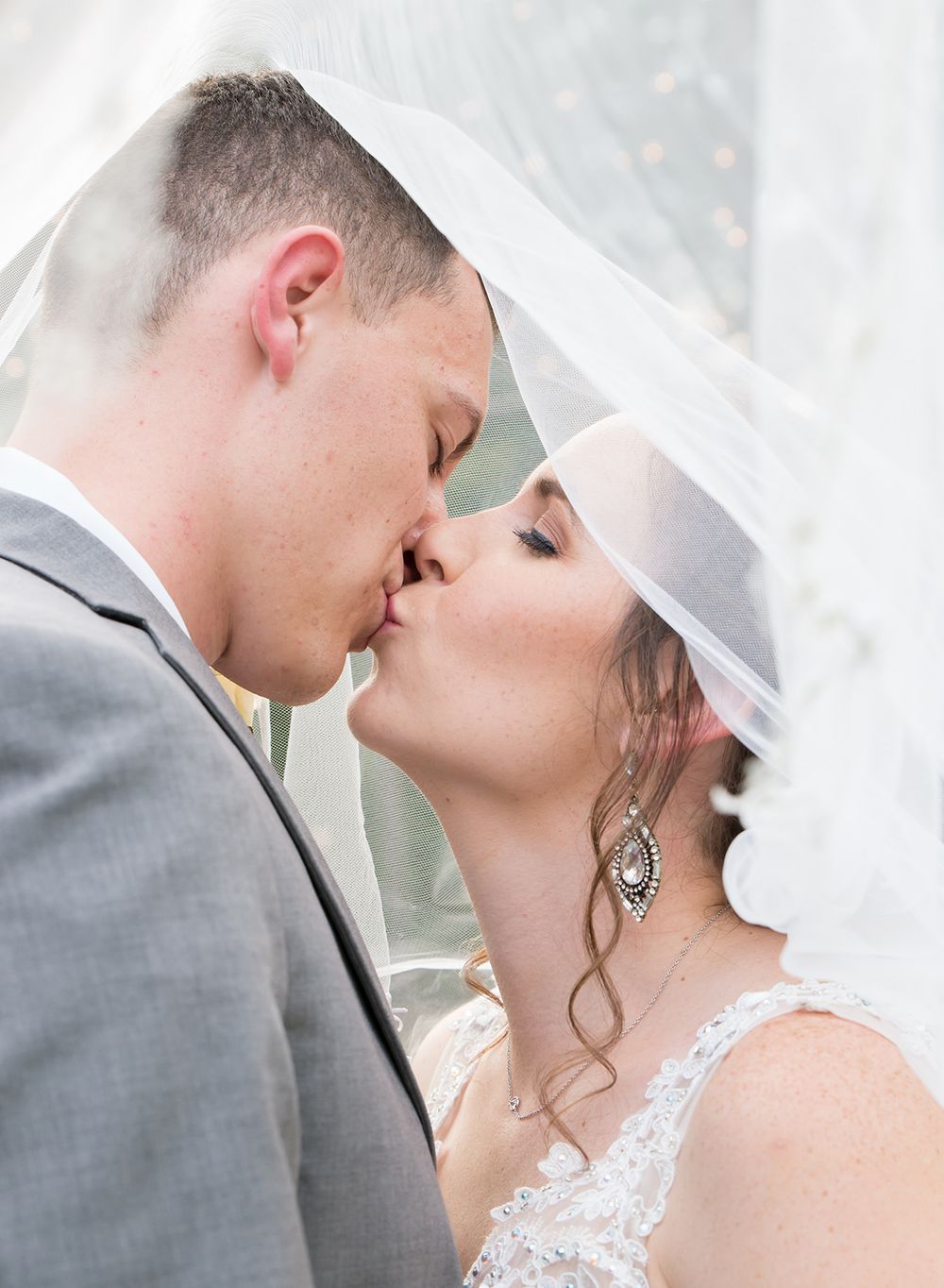 Bride and Groom with veil The Country Squire