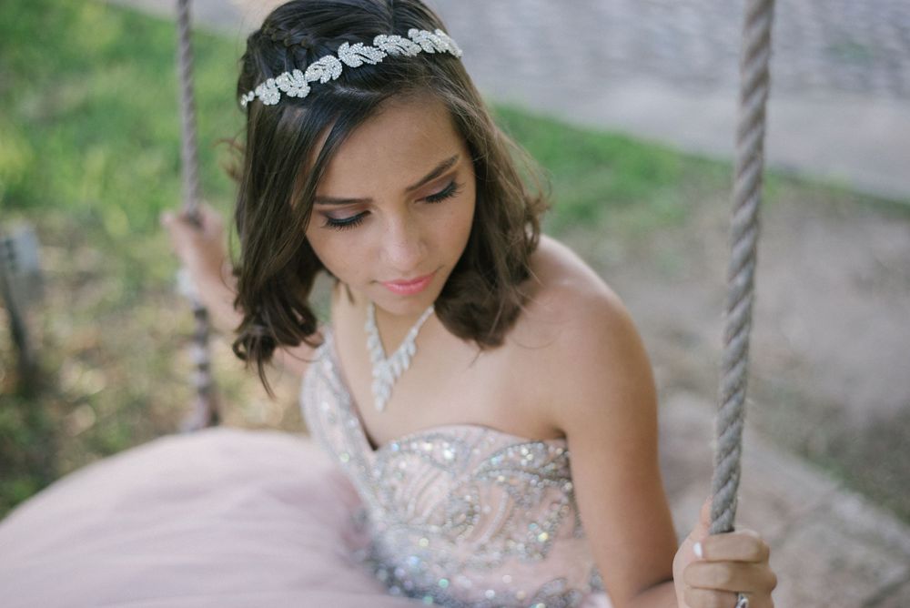 girl posing for a photo. swing. Hidalgo pump house. Hidalgo, texas. wedding photography