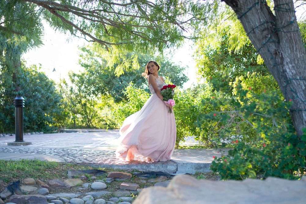 girl posing with bouquet. Hidalgo pump house. Hidalgo, texas. wedding photography