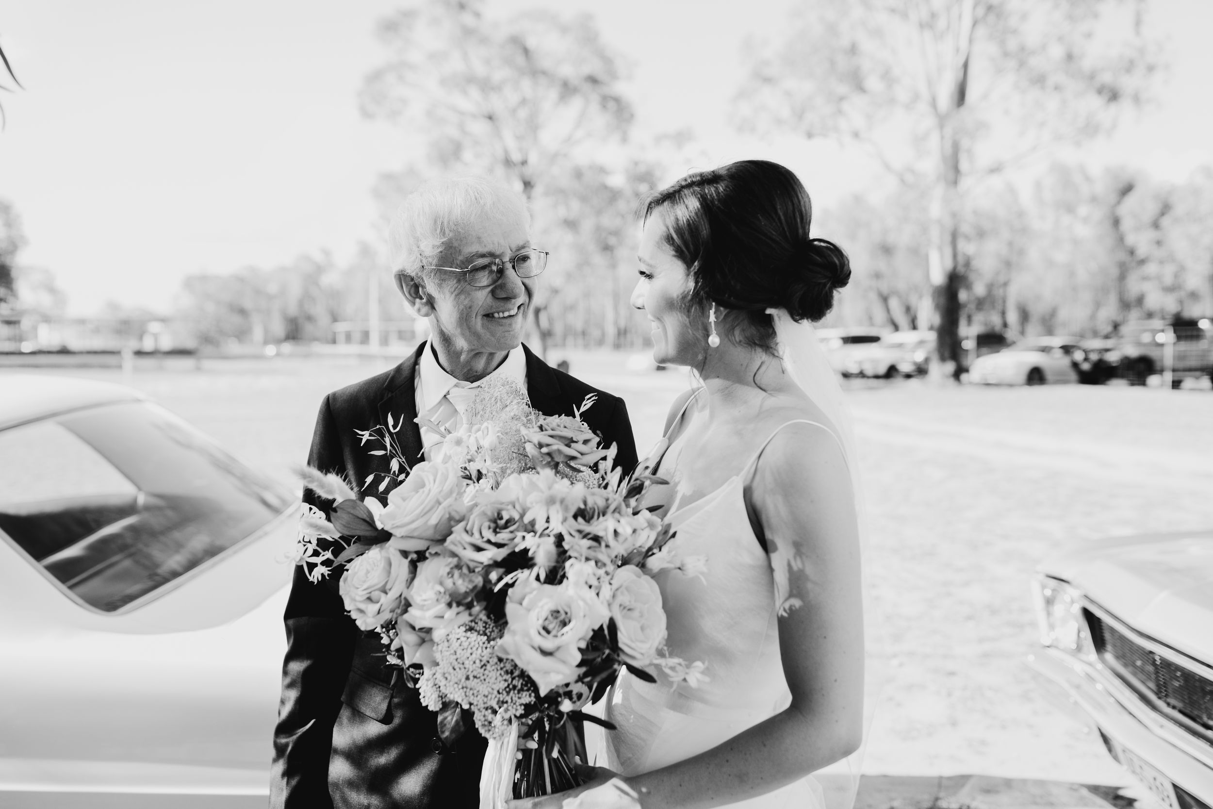 Candid wedding moments captured in a series of black and white photographs showing celebrations and emotions.