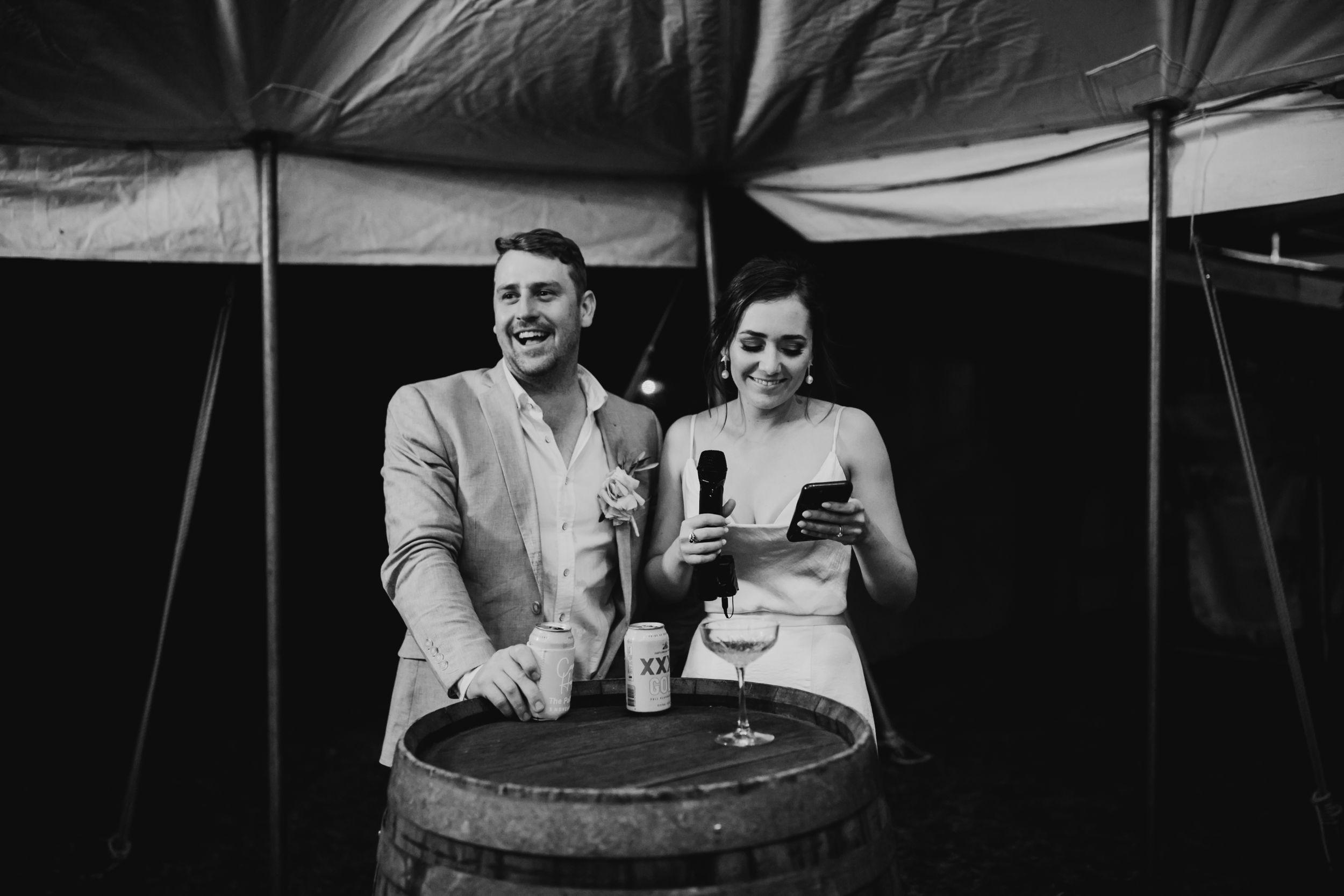 Guests socializing at a casual outdoor wedding reception.