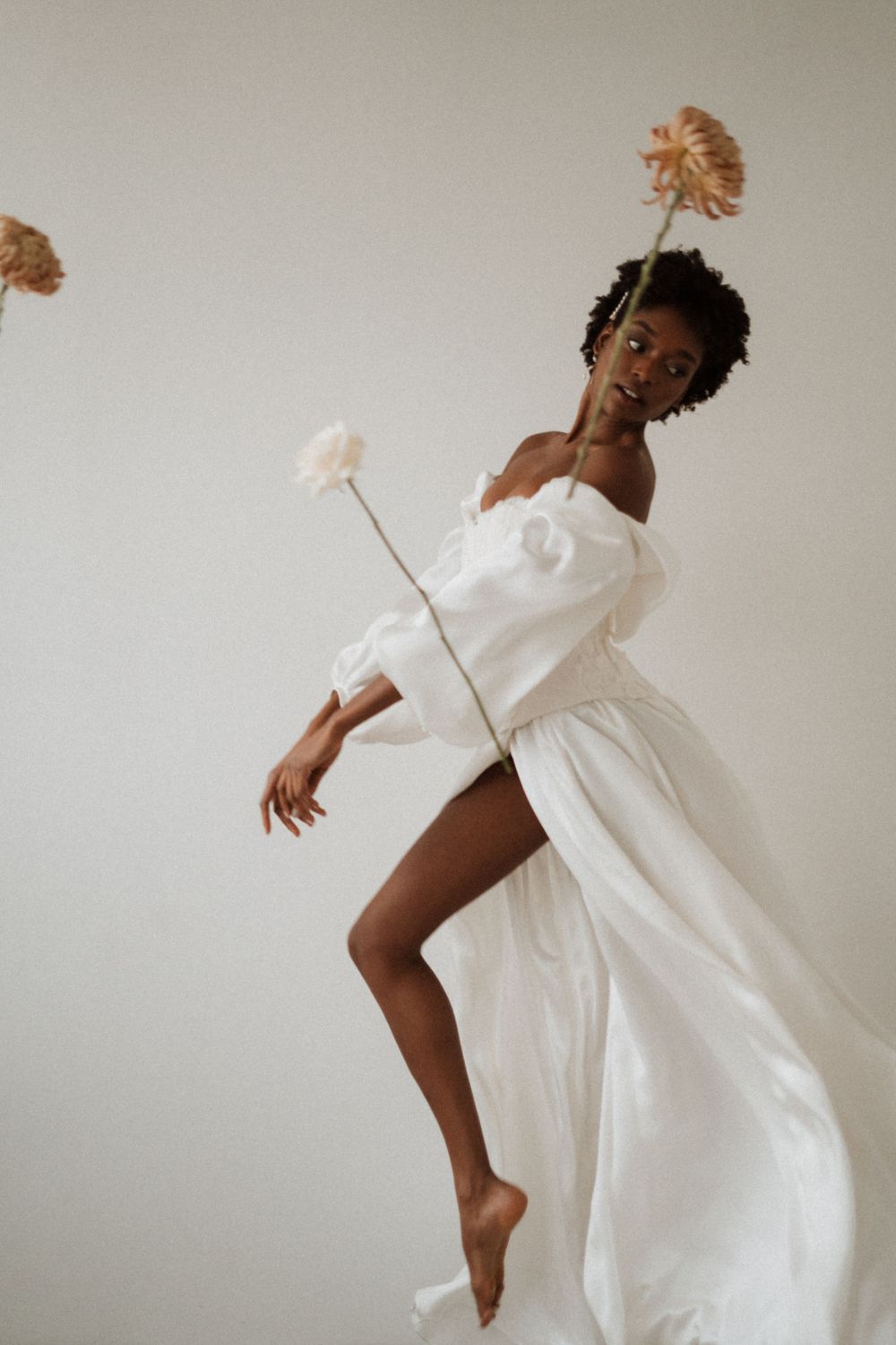 editorial wedding fashion editorial with silk wedding dress by Julita bride ldn and large flowers inspired by Prada