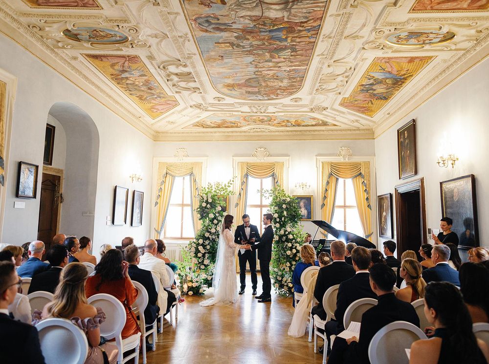 Wedding ceremony in the Lobkowicz palace, Prague: A grand celebration of love and union in a majestic setting.