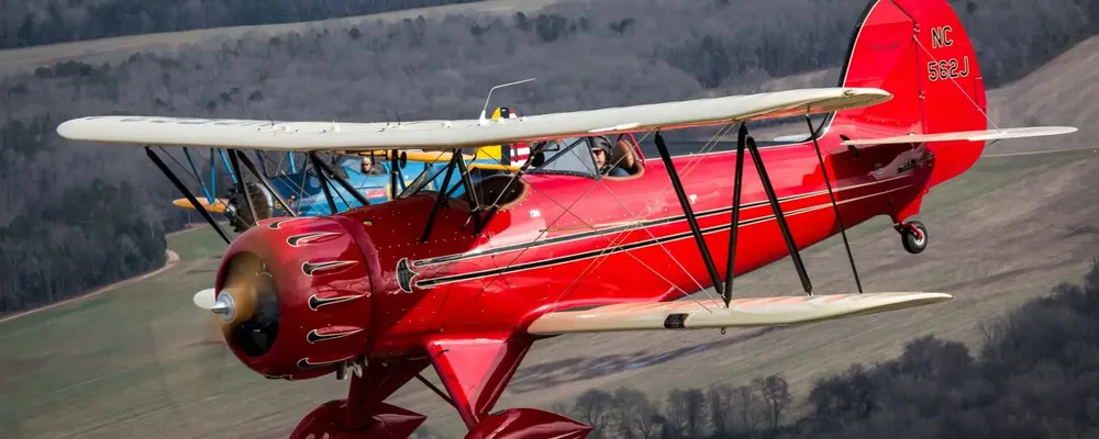 Air to Air Photograph of a Waco and Stearman over Davie County NC