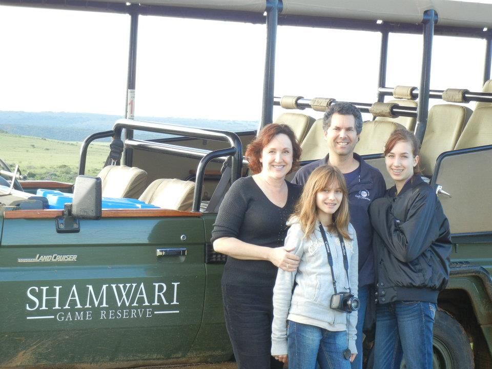 Old photograph from 2012 of me and my family on a safari in South Africa. I have a camera around my neck.