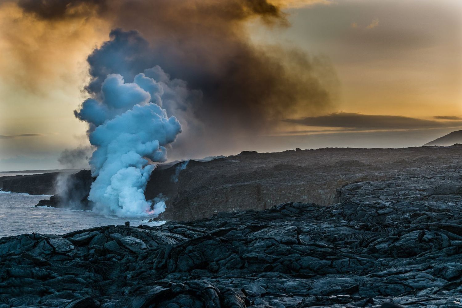 Image of lava falling into the ocean near Hilo, Hawaii