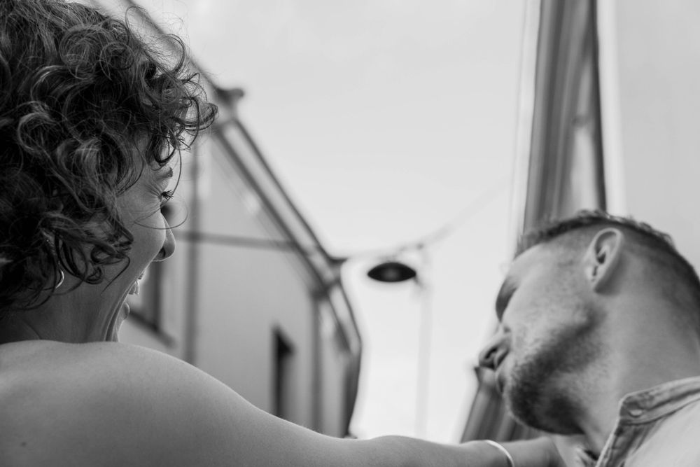 A man and a woman hugging.
