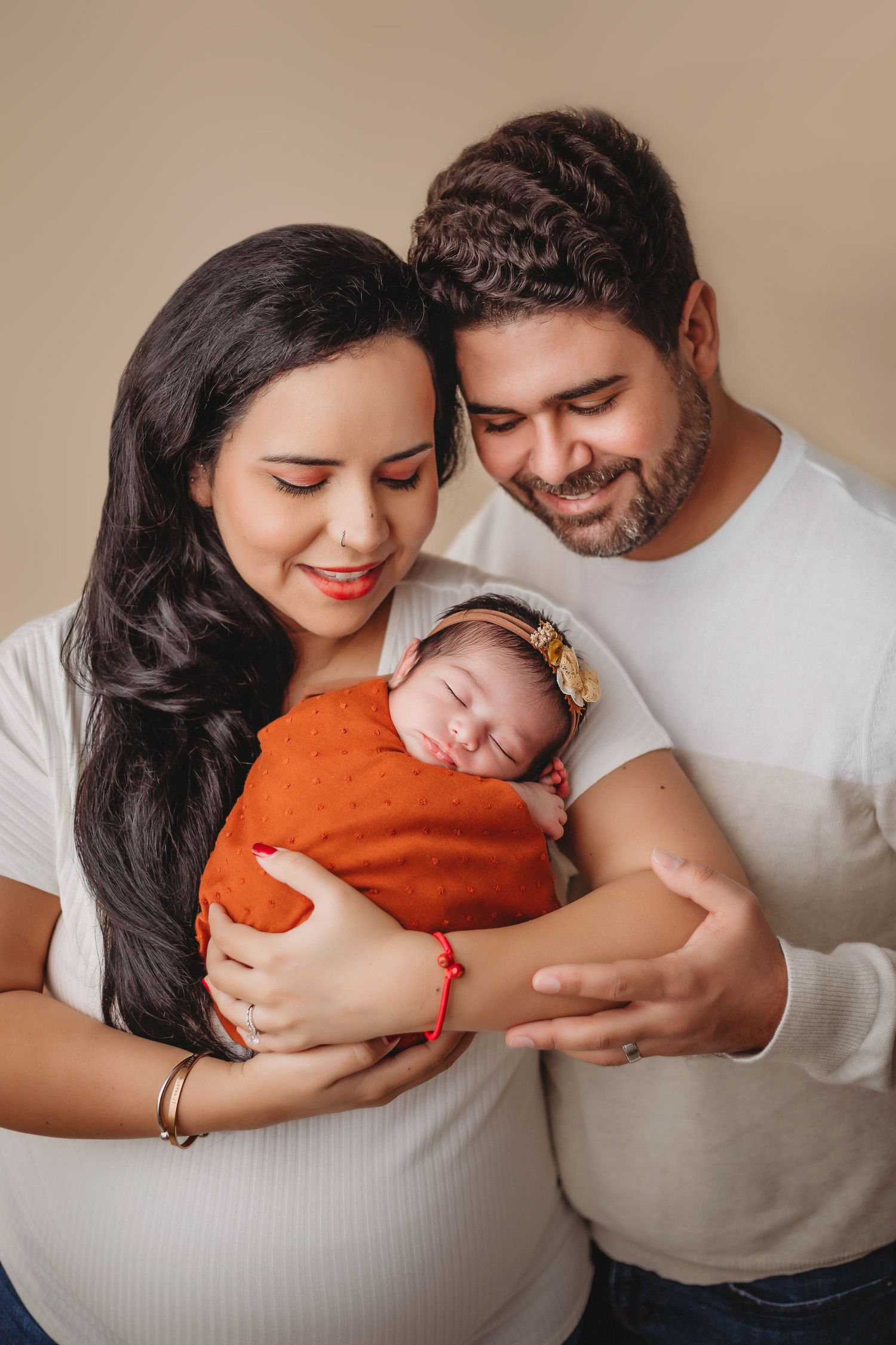Tampa Newborn Photographer- Family posing with newborn baby