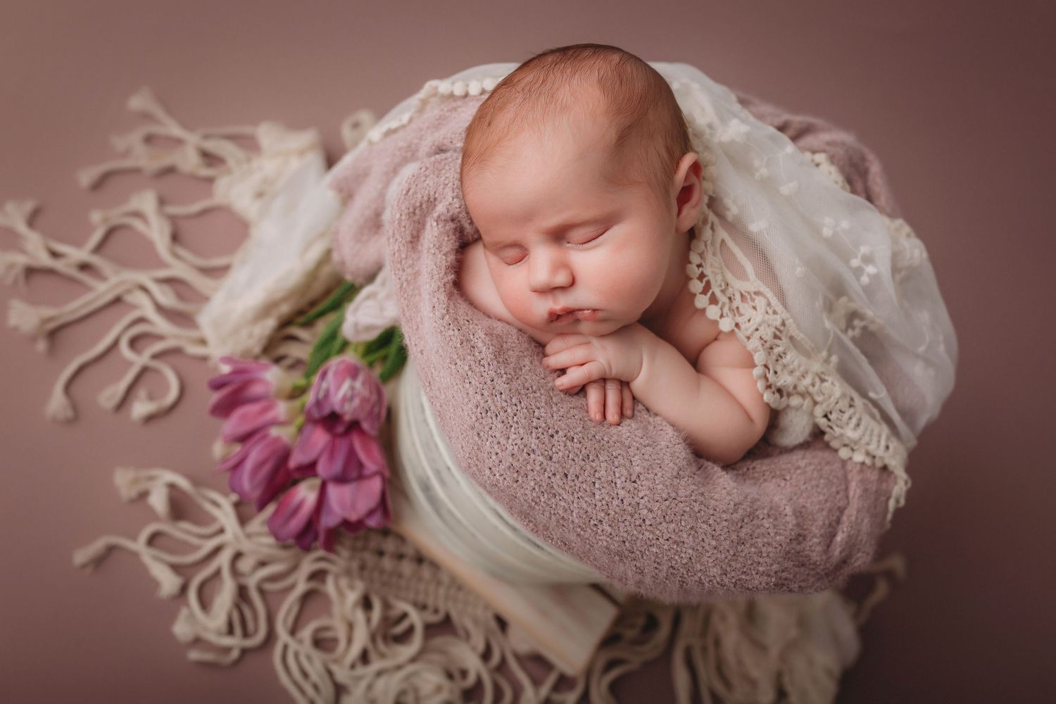 Tampa Luxury Newborn Photographer- Baby in basket with fresh flowers
