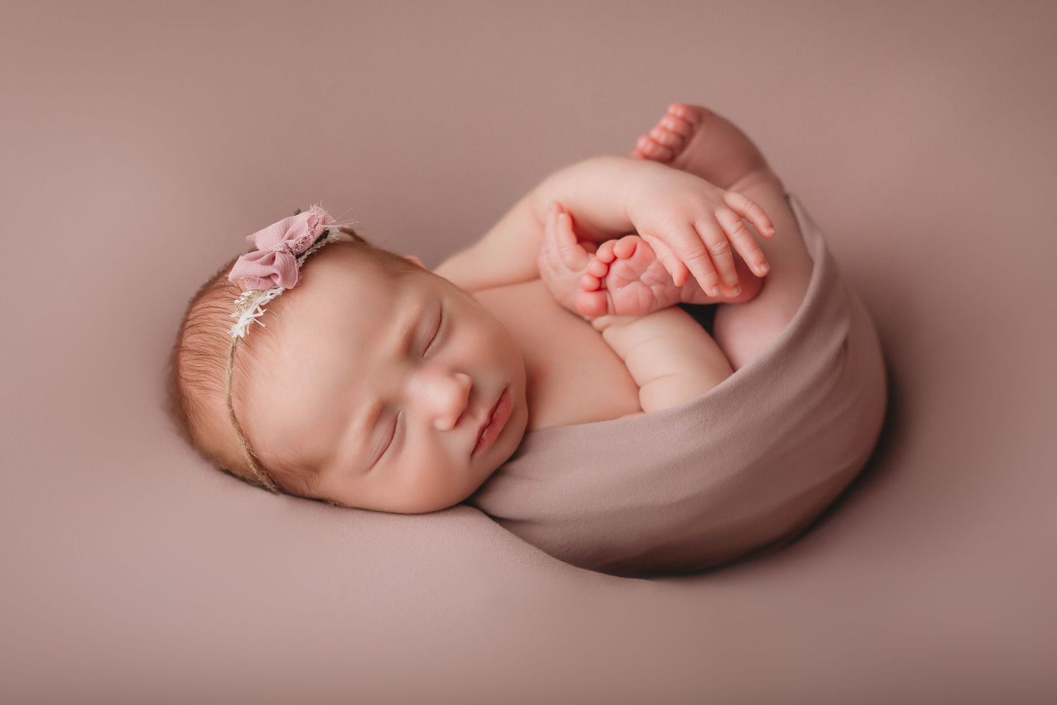 Tampa Newborn Photographer- Baby with purple headband