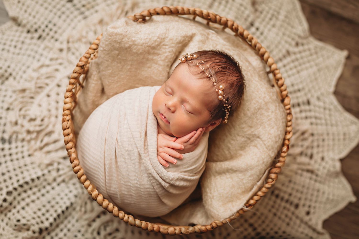 Florida Luxury Newborn Photographer- Baby in basket with pearl headband
