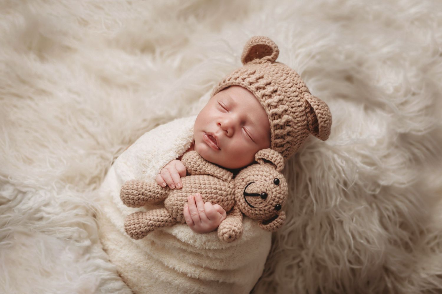 Tampa Newborn Photographer- Baby holding stuffed bear