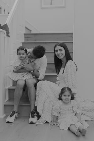 Black and white photo series showing close-up moments of young child sitting and playing at home.