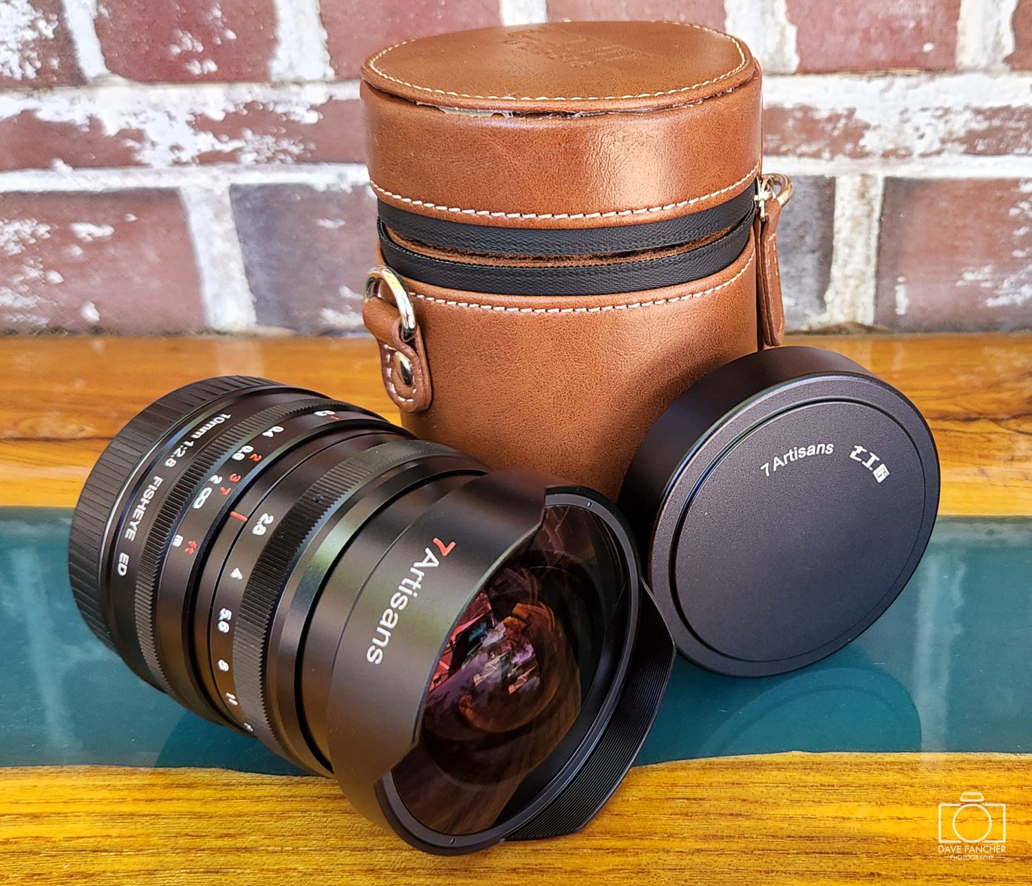 7artisans fisheye lens, lens cap, and case