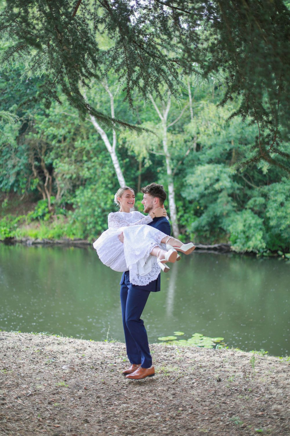 Candid photo of bride and groom at an outdoor wedding venue