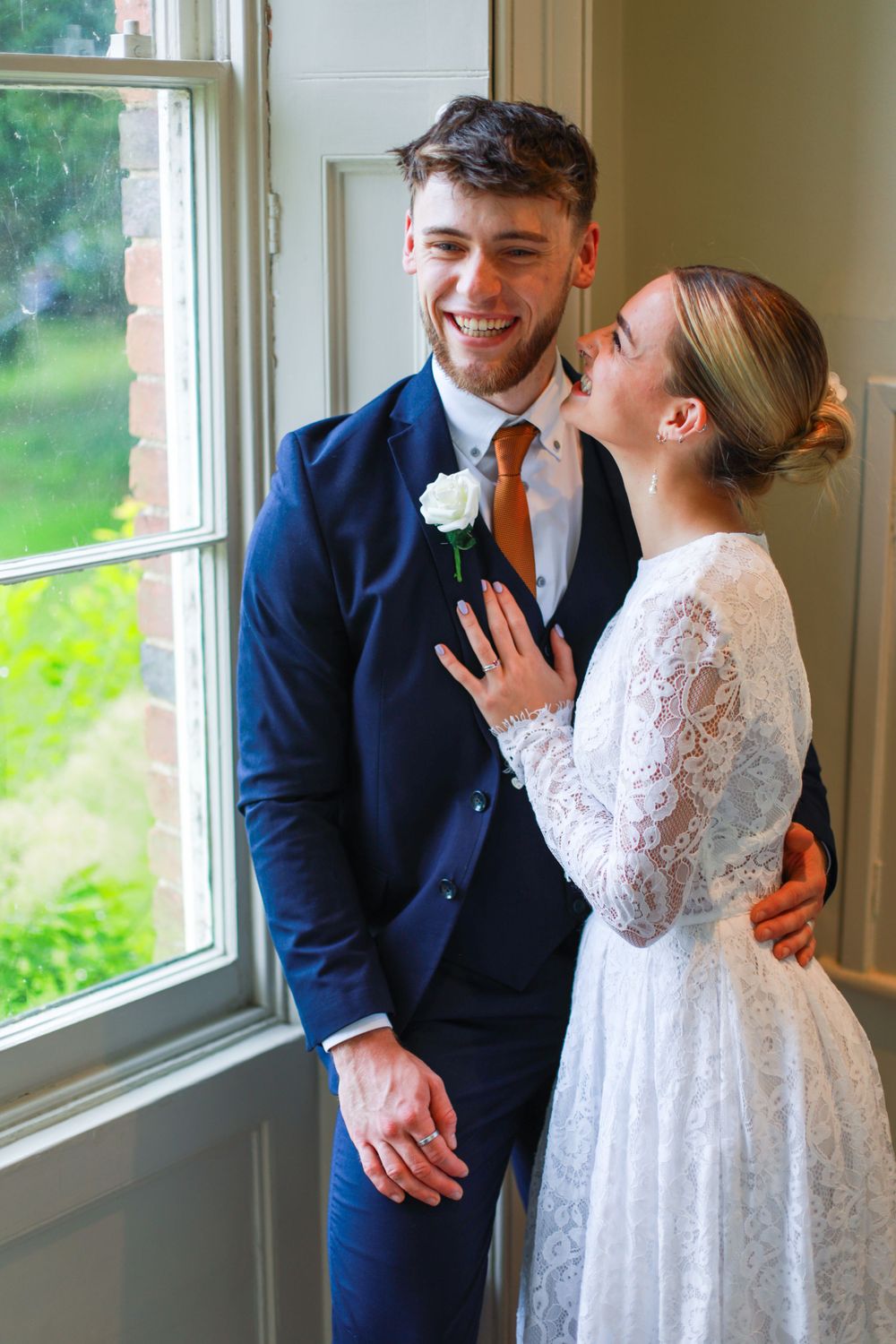 Candid photo of bride and groom at a wedding venue