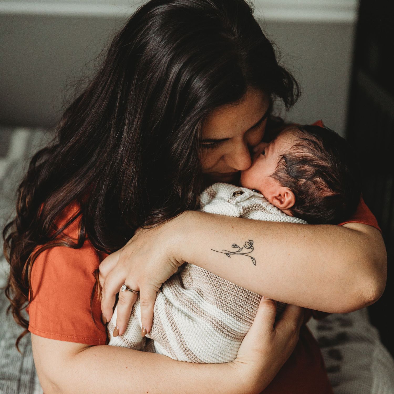 Mother and son lifestyle newborn photo in home