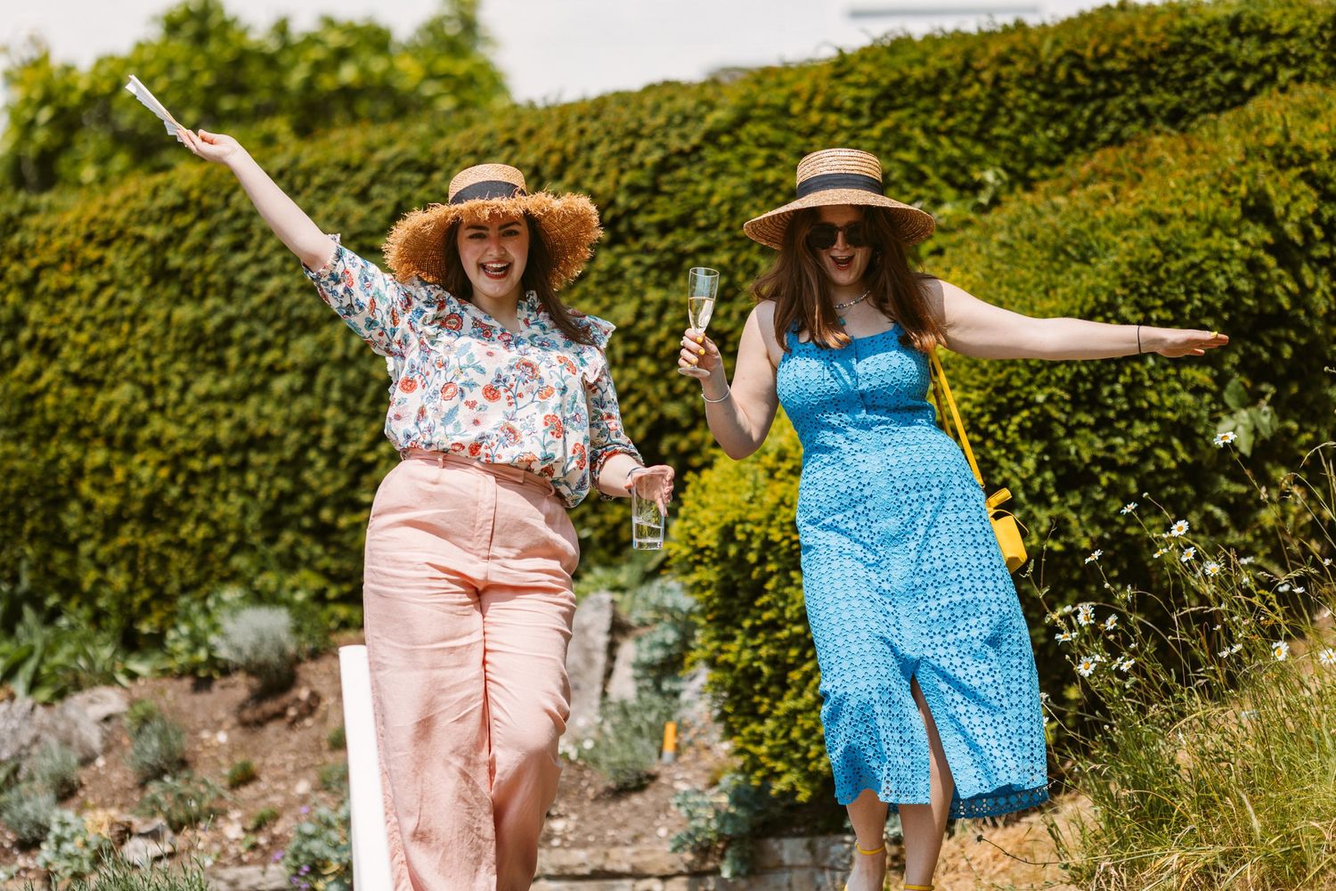 Guests with sun hats on and having a great time