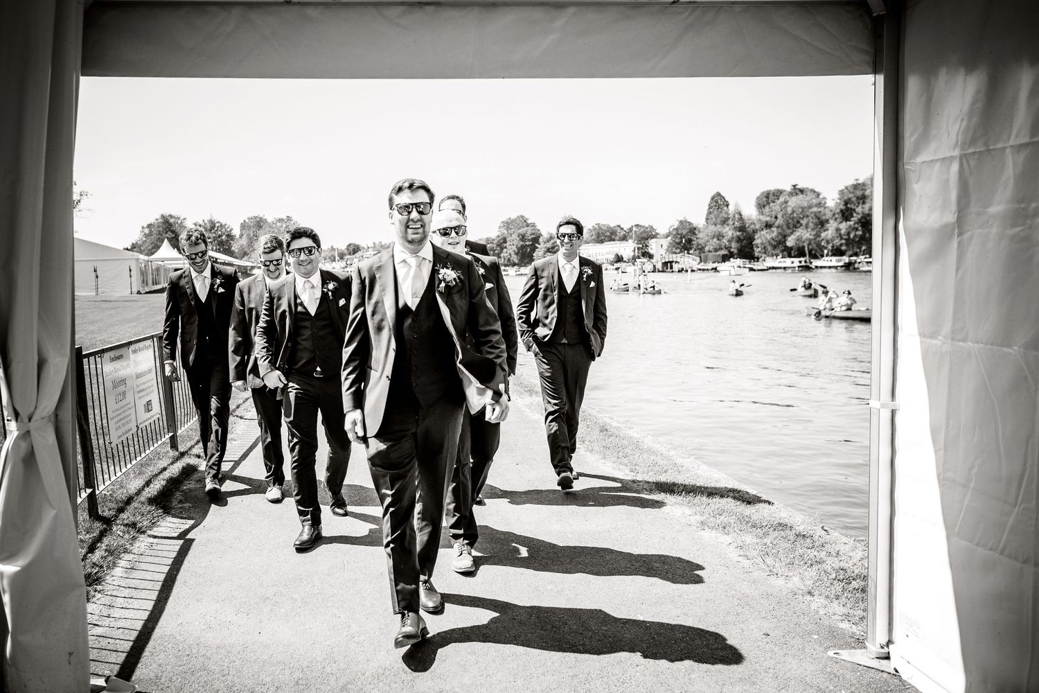 Groom and Groomsmen arriving at wedding venue via the river