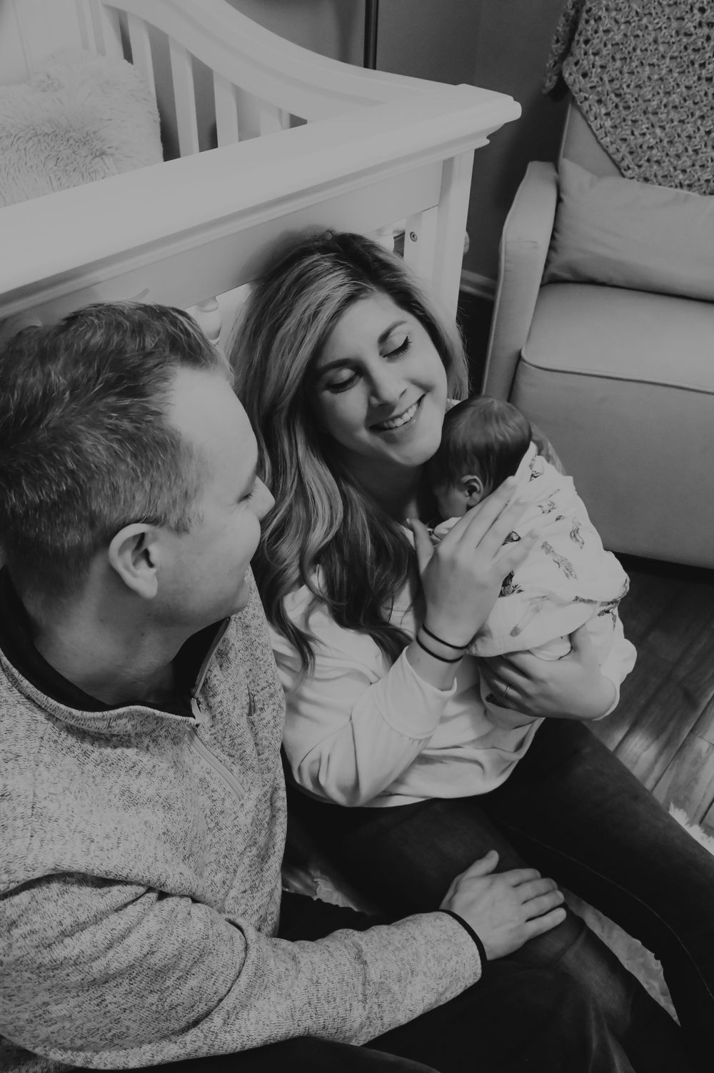 Candid black and white photo sequence capturing playful interaction between family members.