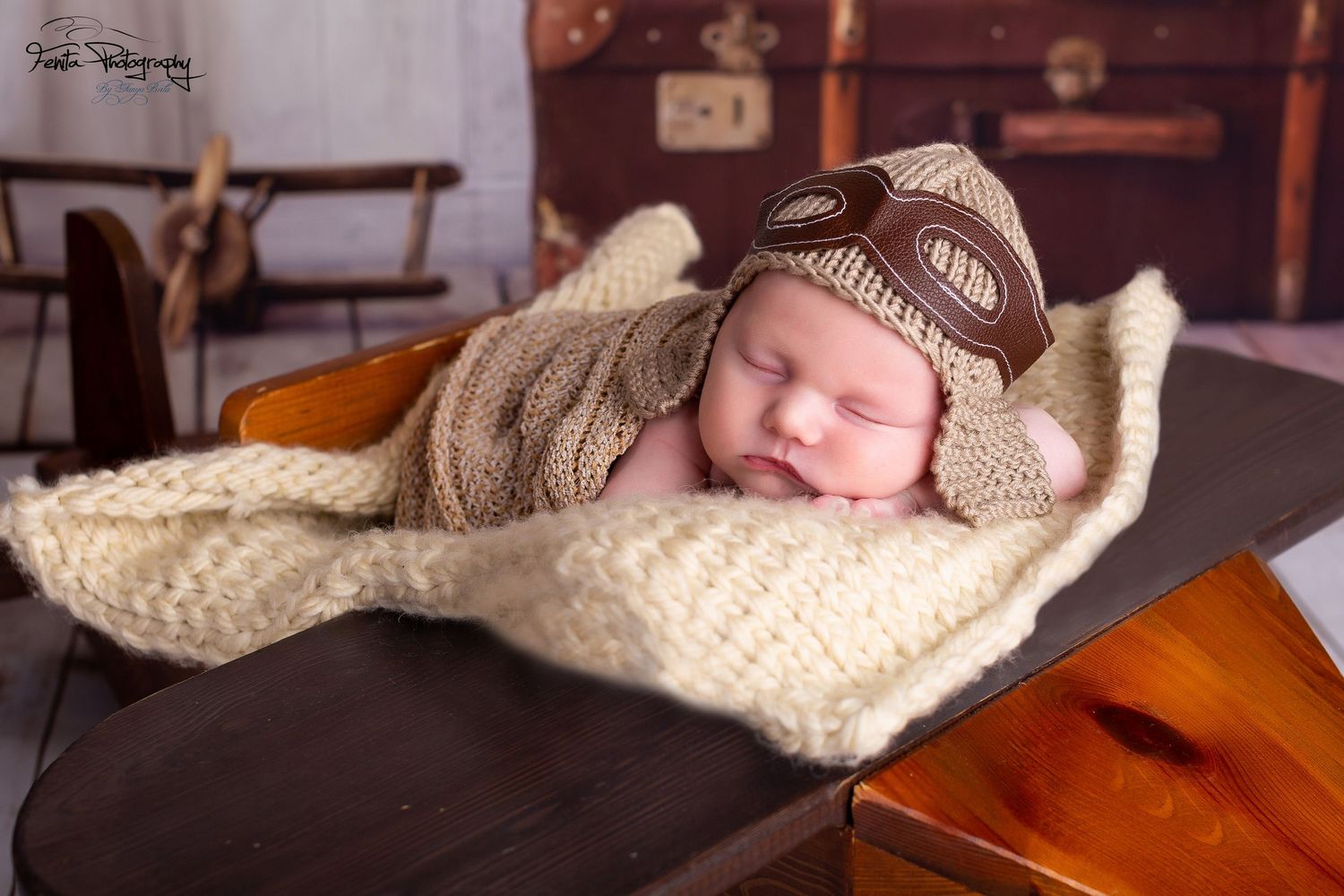 newborn baby sleeping on the plane