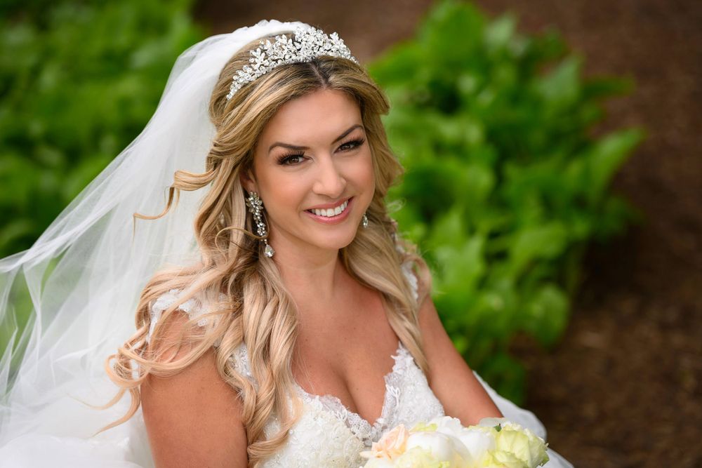Bride on wedding day at Firestone Country Club photographed by Tom Forrest.