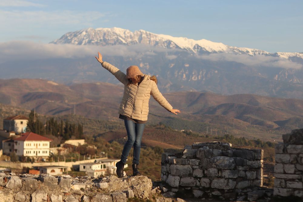 Girl on top of a castle in Albania storytelling cinematic photographer