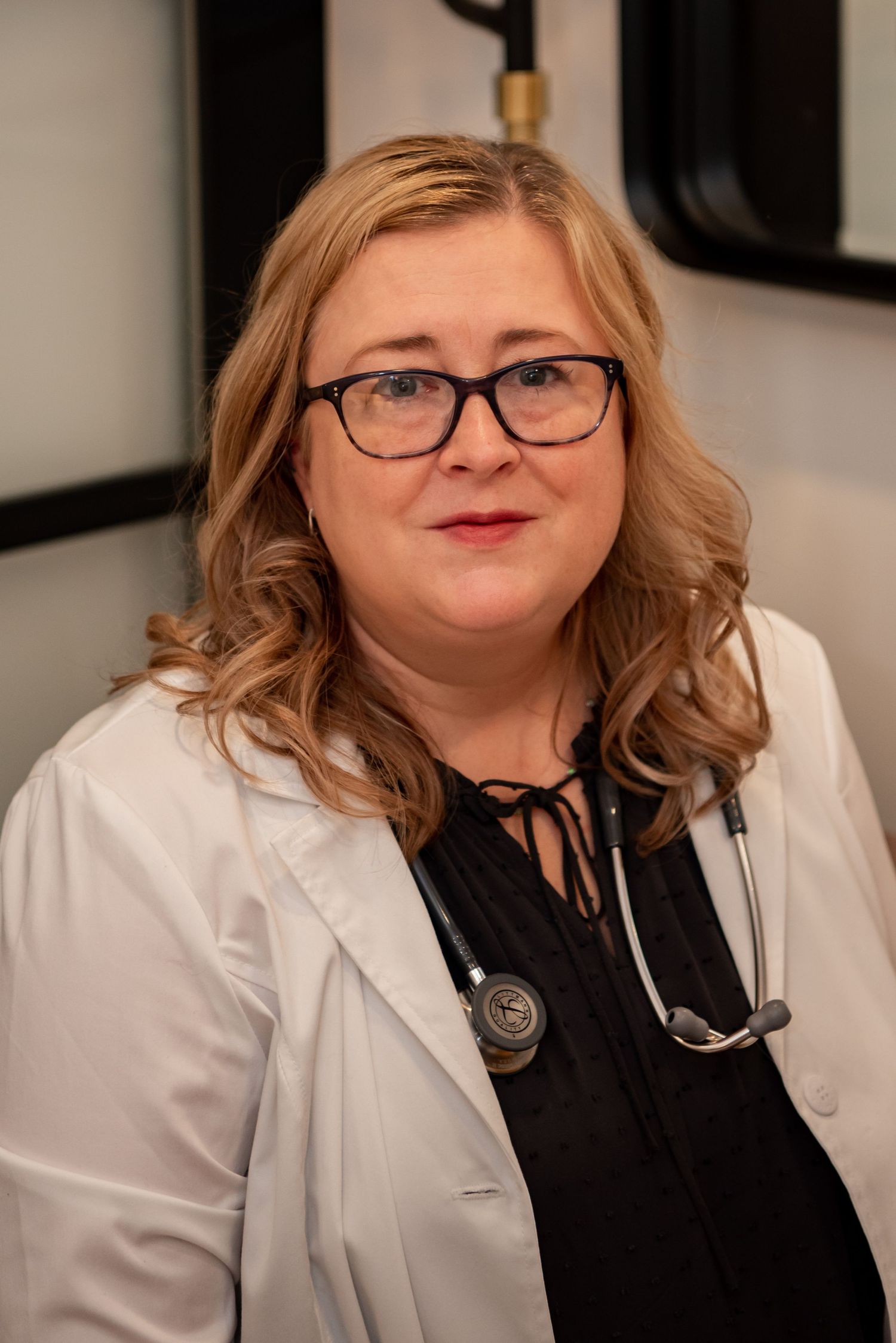 woman physician, blond hair, white coat and stethoscope rebecca byard