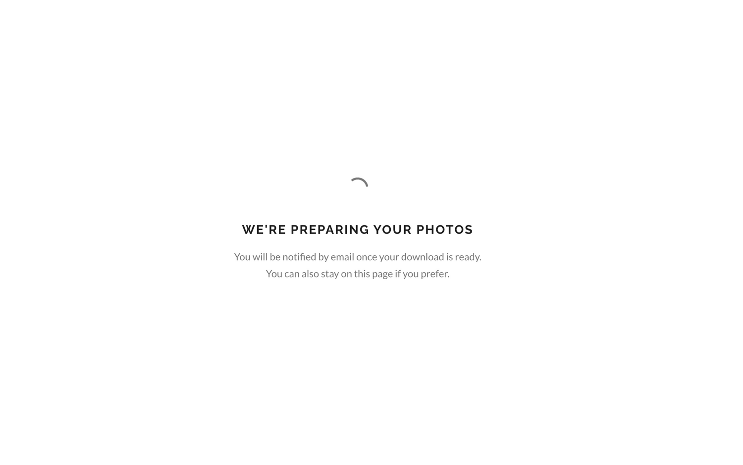 Wedding photo preparation page displaying we are preparing your photos loading message with spinner.