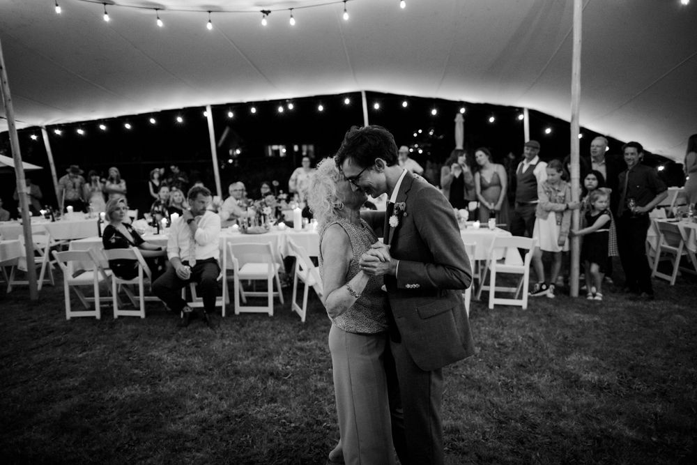 The groom and his mom dancing at night