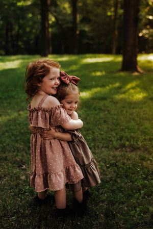 2 little girls in an embrace