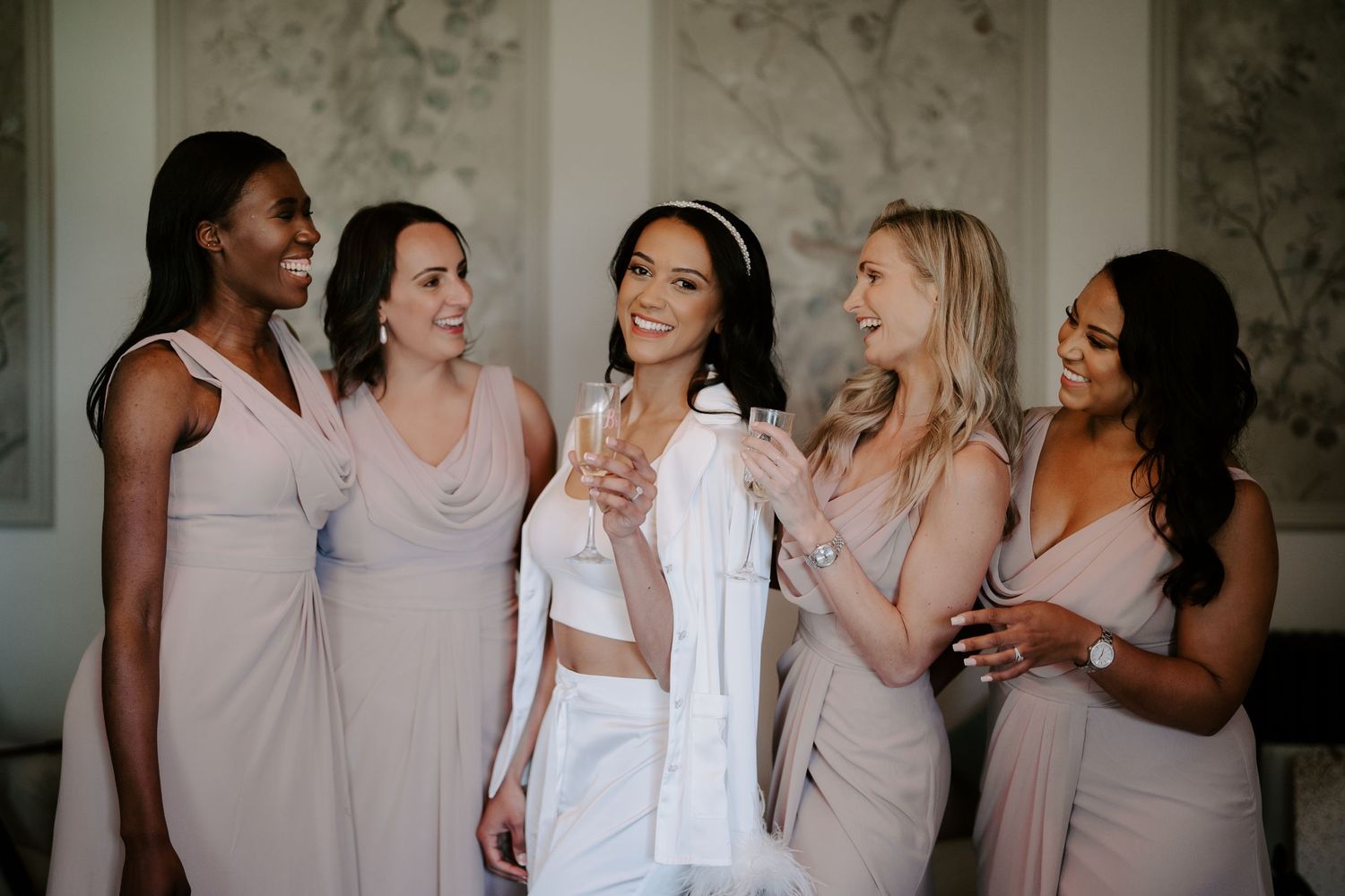 bride-and-bridesmaids-toasting-champagne-stockton-house-wedding-shropshire