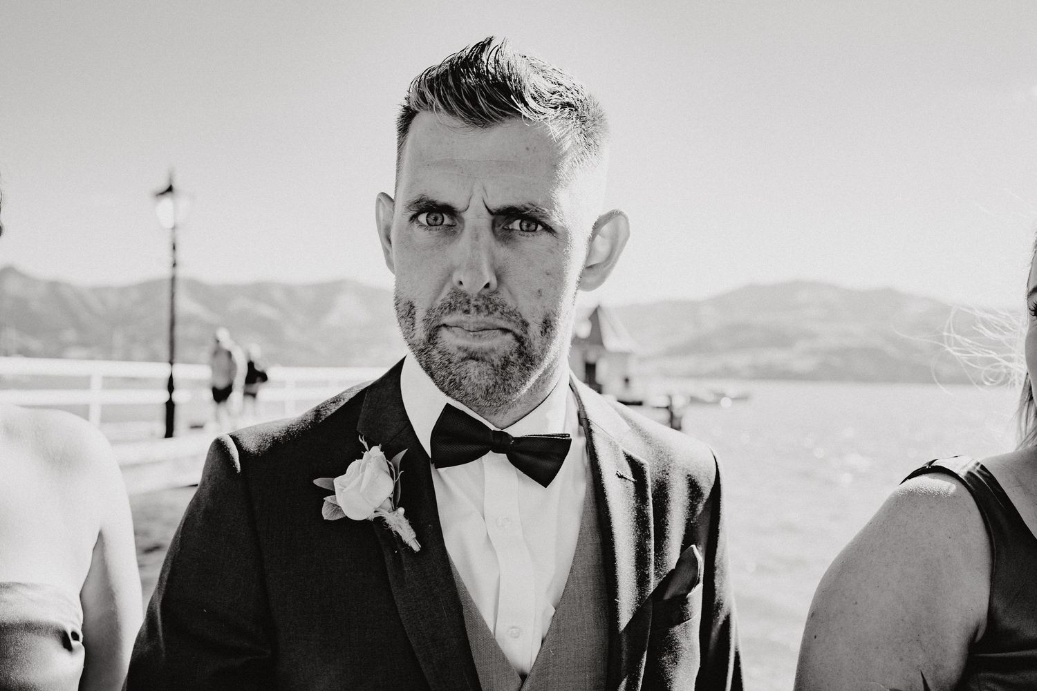 Black and white photos of wedding party members in bow ties and formal wear.