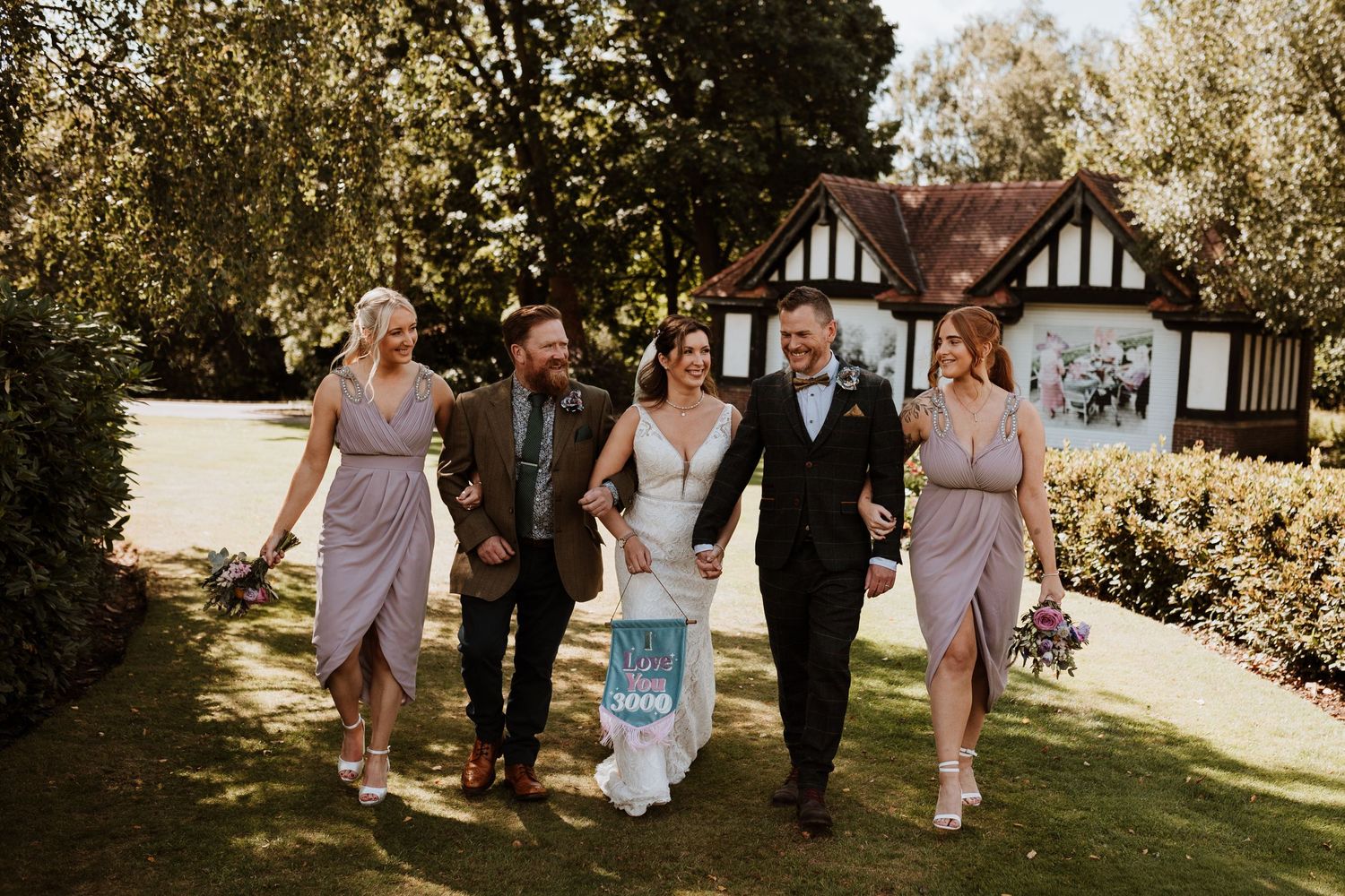 Fun wedding party shots in Wigan Park