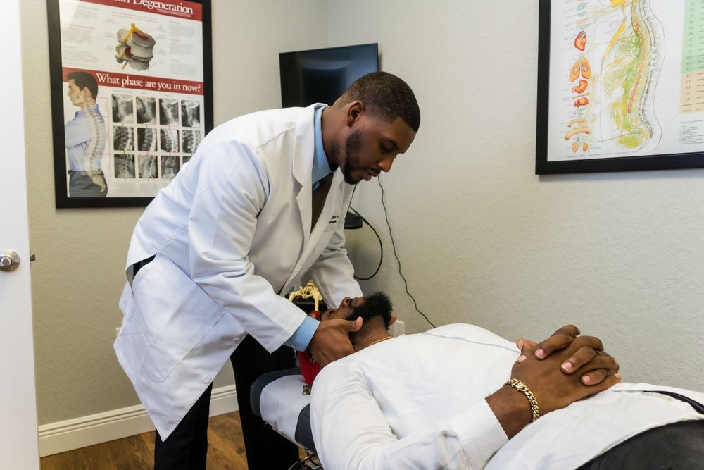 Medical professional performing patient examination in clinical setting.