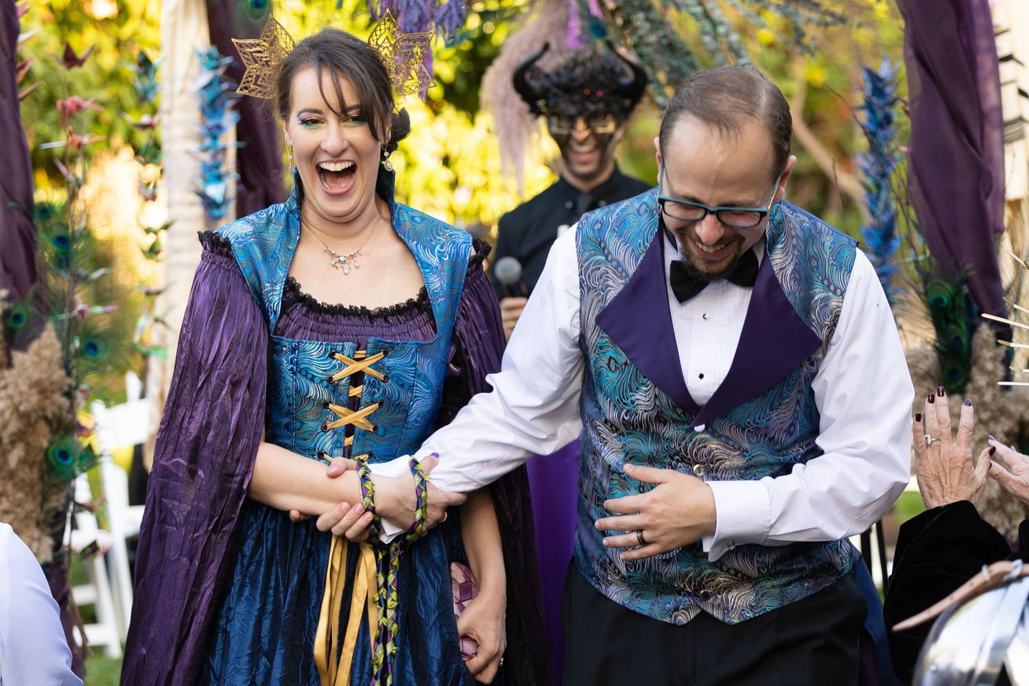 Bride and groom smiling after getting married.