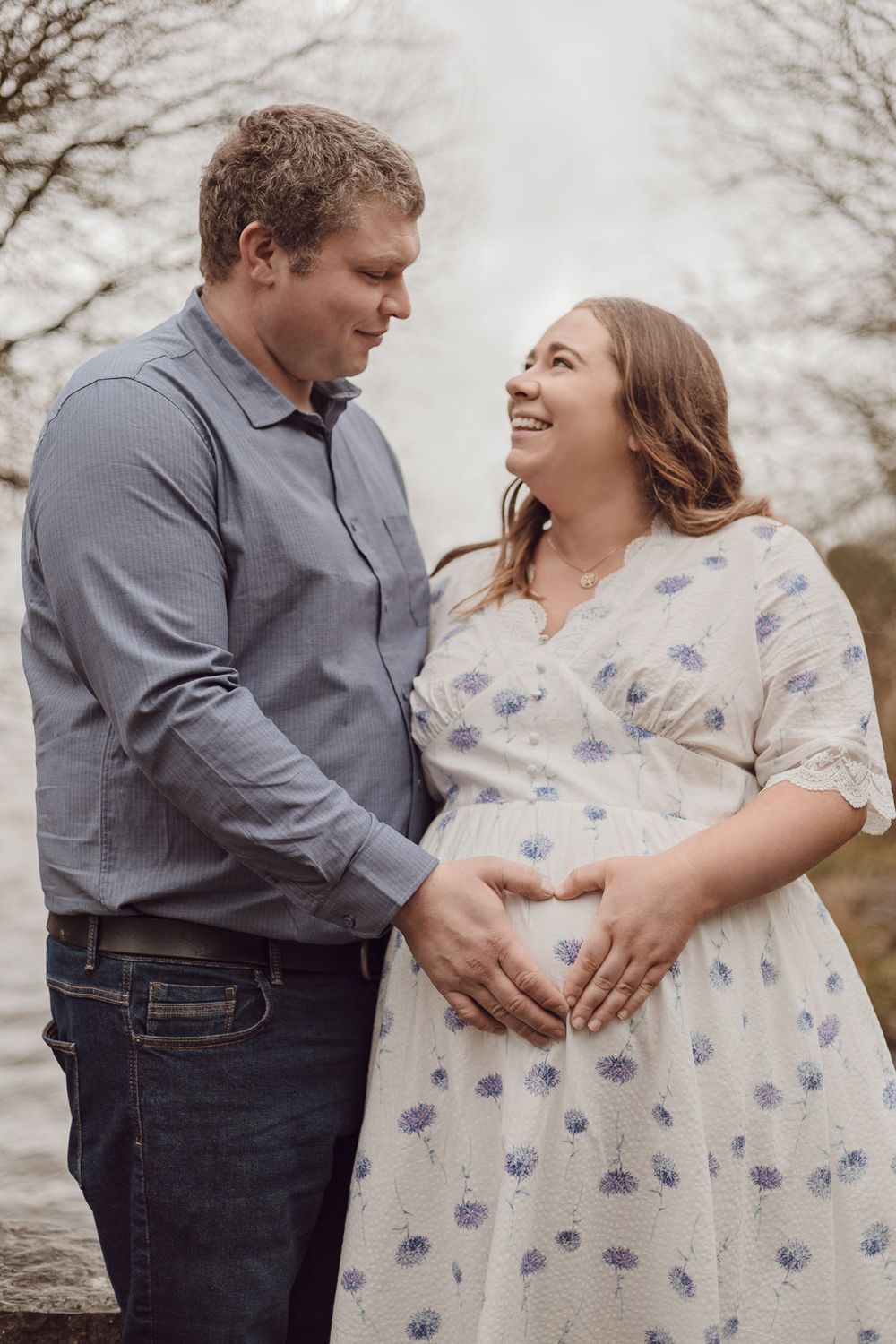 maternity photoshoot of mum and dad outdoors