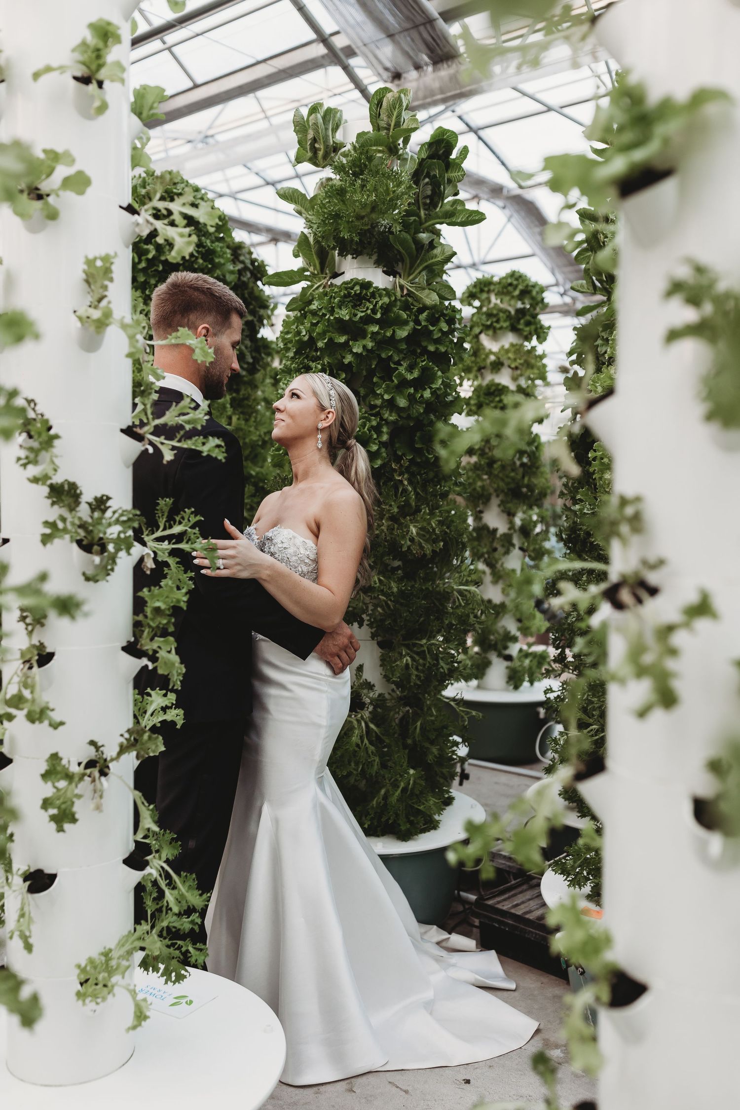 Bride and groom looking at each other in the garden taken by South Florida Wedding Photographer Lemon and Honey Co.