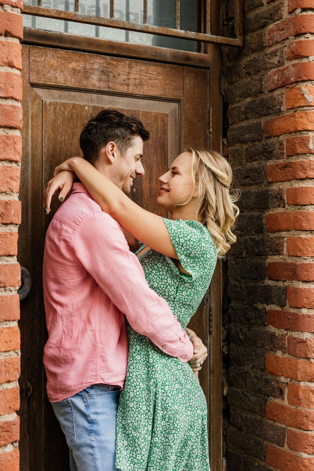 romantic nook in Cape Town,  couple in front of red brick