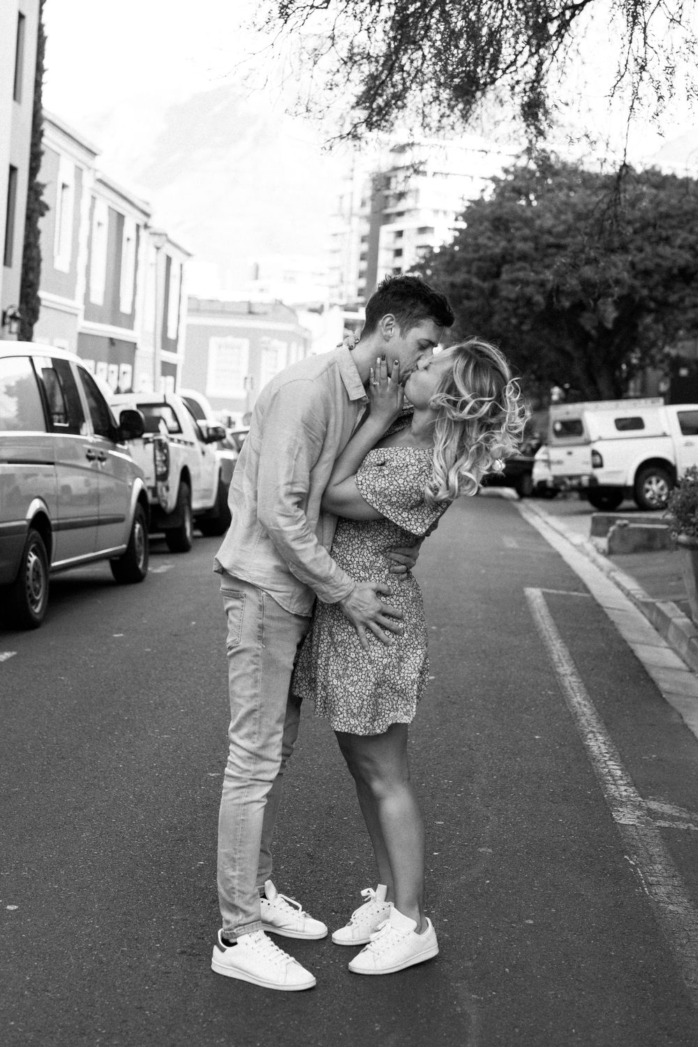couple kissing on the streets at Die Waterkant in Cape Town