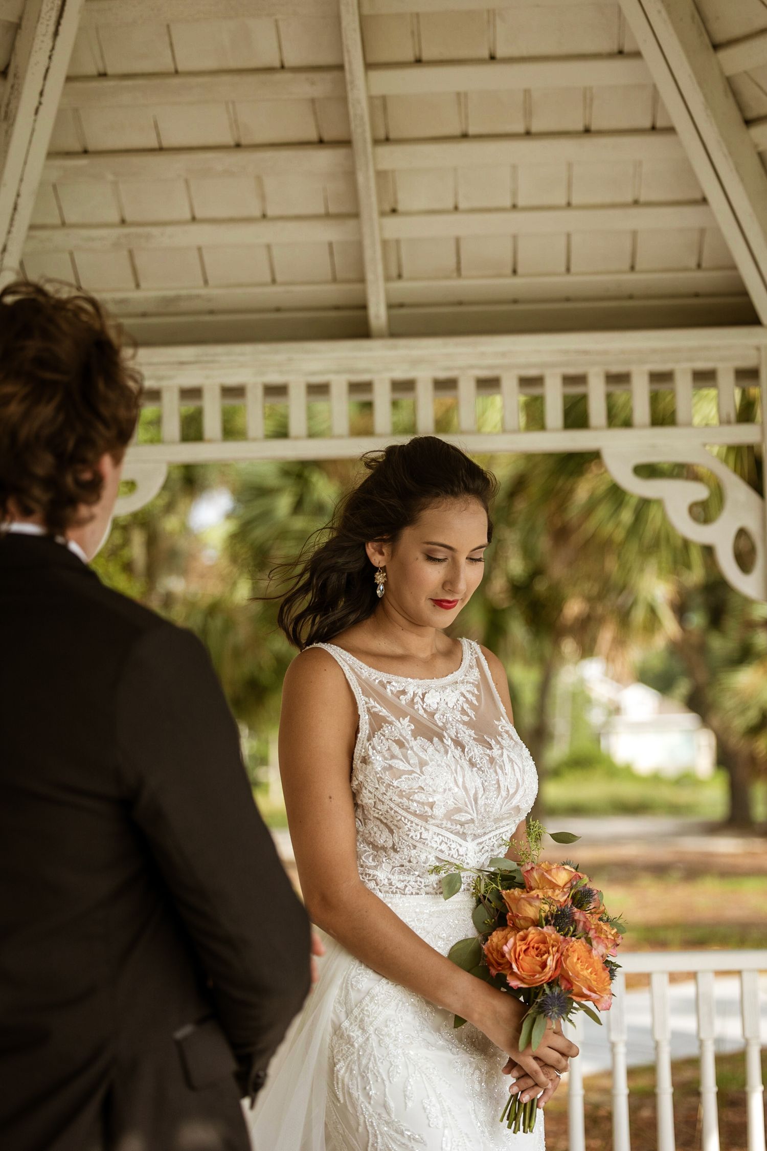 A bride walking to her groom in a gazebo on the marsh of the Landings, Skidaway Island, Ga.