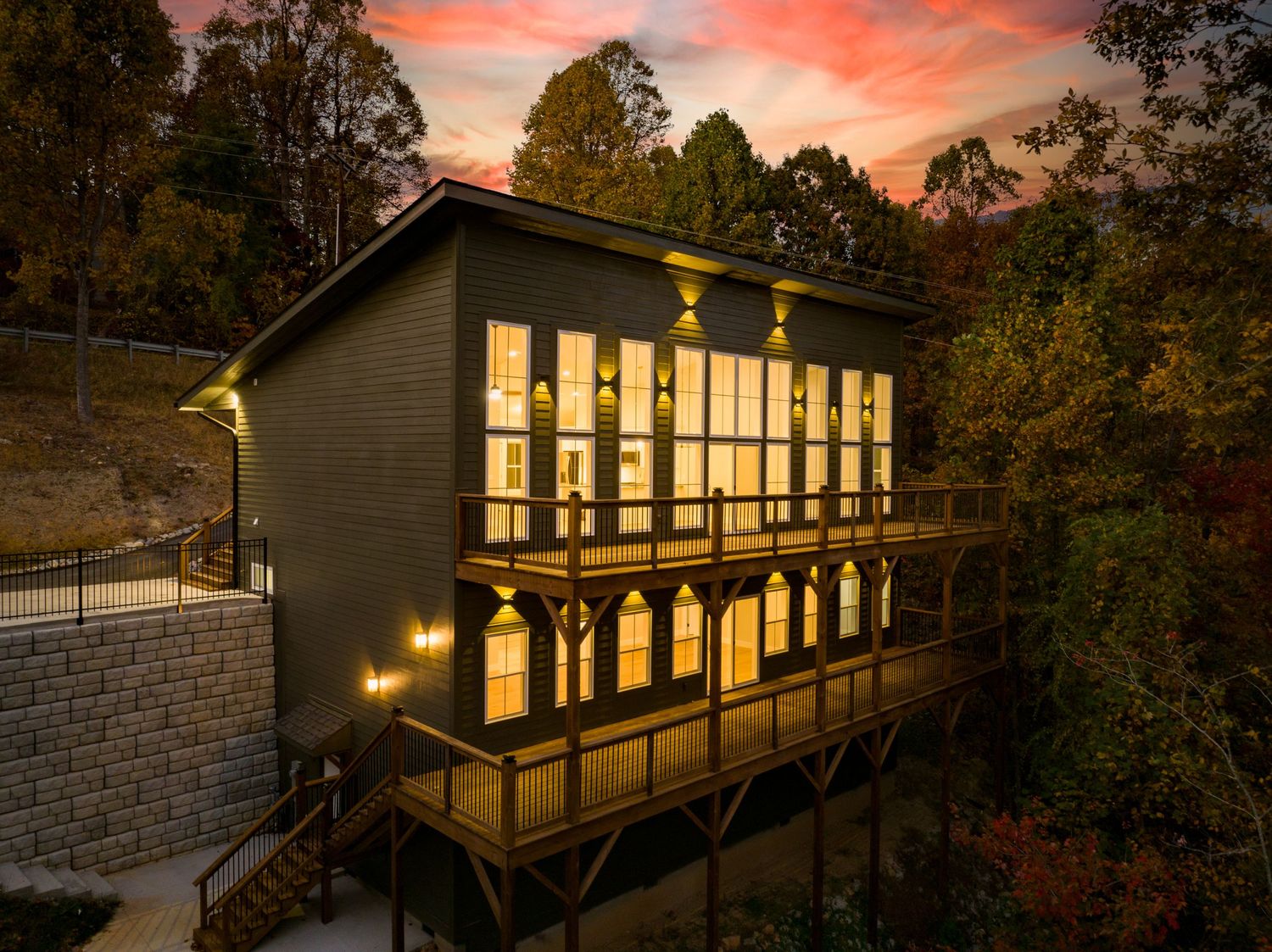 Asheville, NC. Luxury home with large deck, large clear windows, and twilight lighting. By Virtually Calhoun