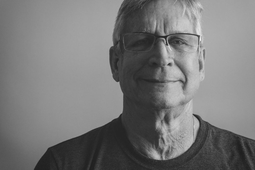 black and white man close up split lighting