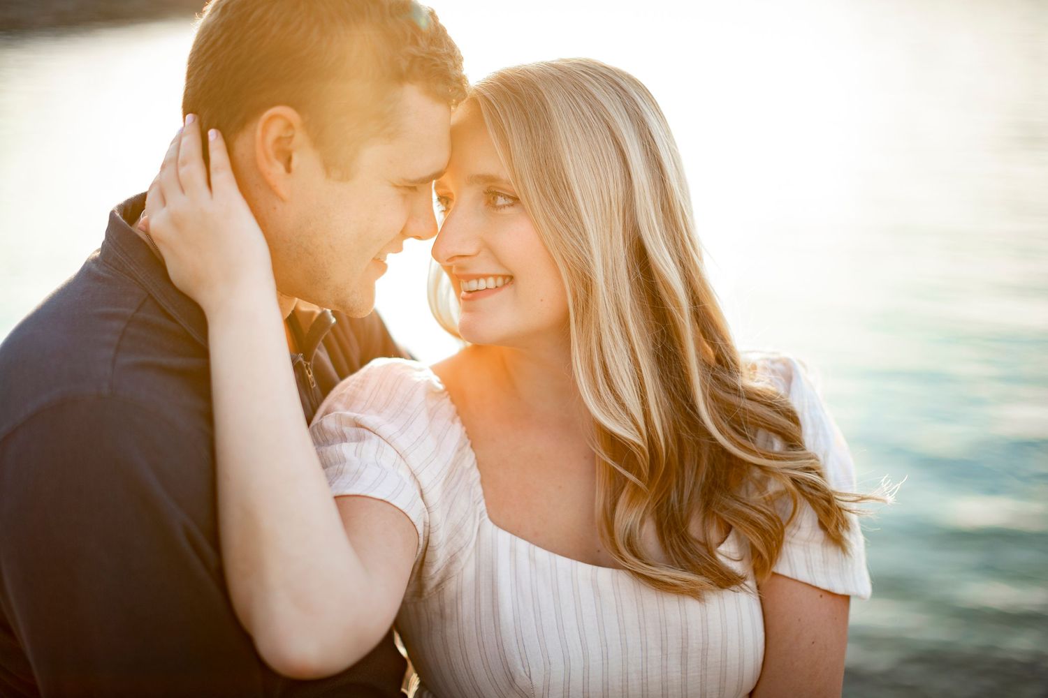 Romantic sunset photoshoot at a scenic beach location.